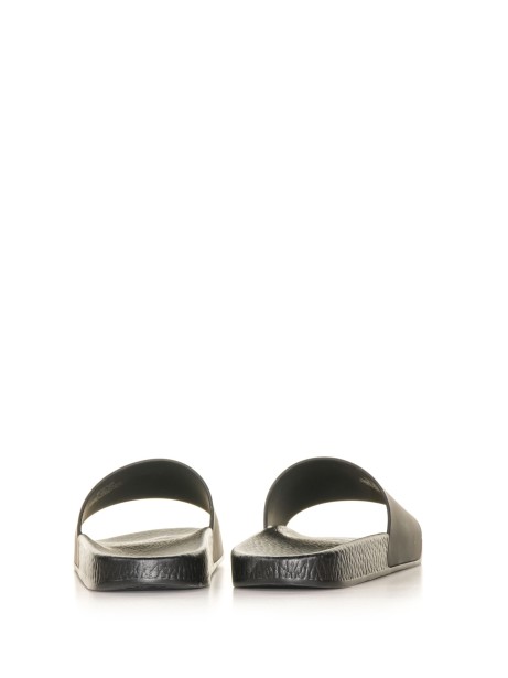 Rubber slipper with logo