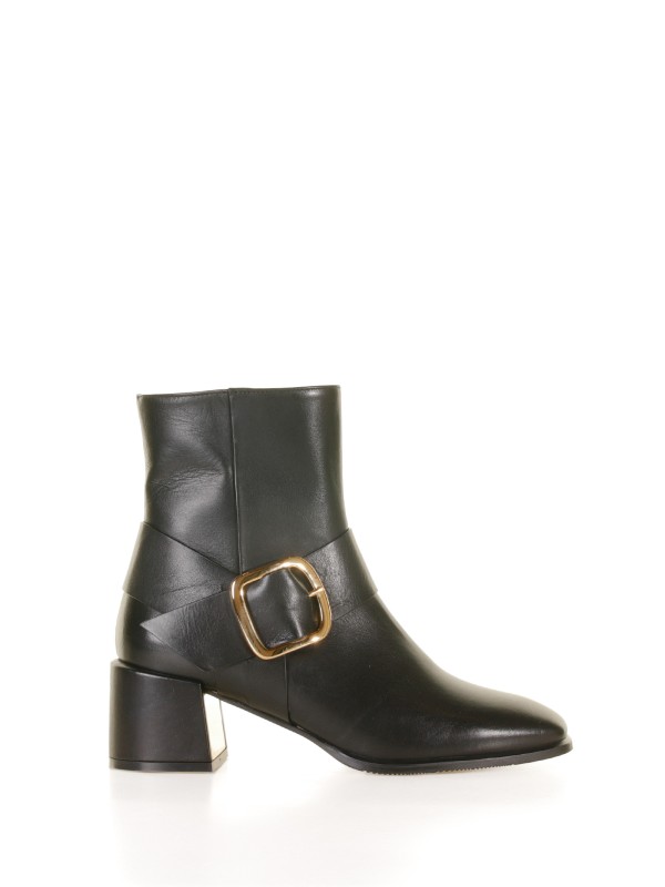 Leather ankle boot with golden buckle