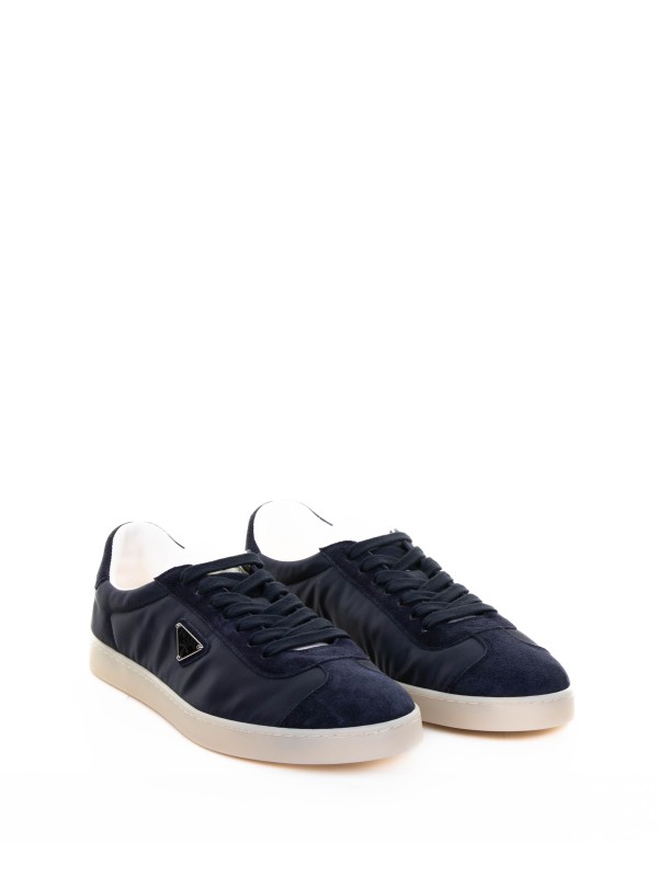 Navy blue sneakers with logo