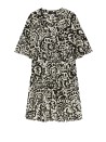 Short dress in patterned jersey