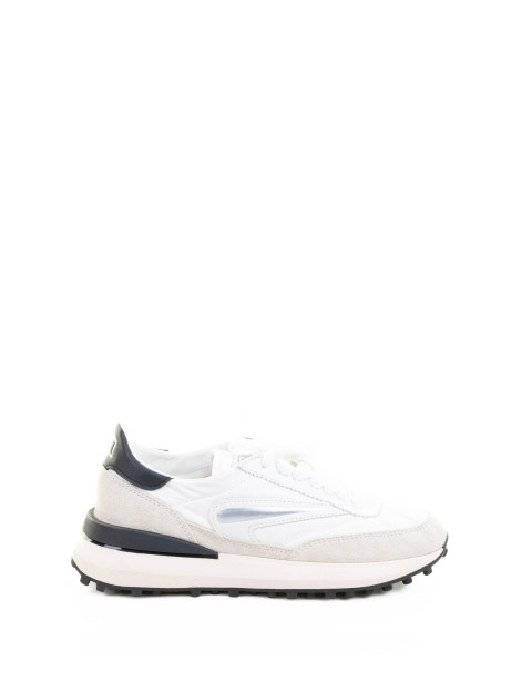 Black and white Athleta sneaker in nylon and suede