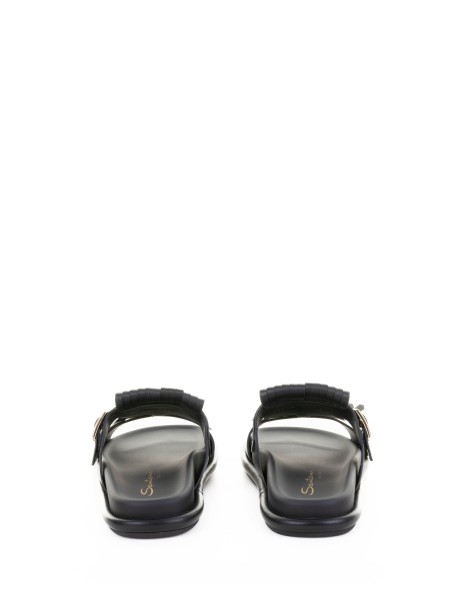 Black leather slipper with fringe