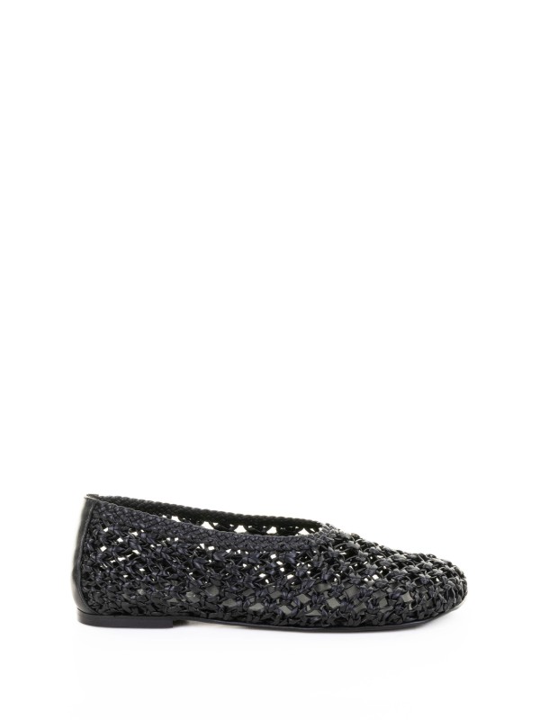 Perforated leather slipper