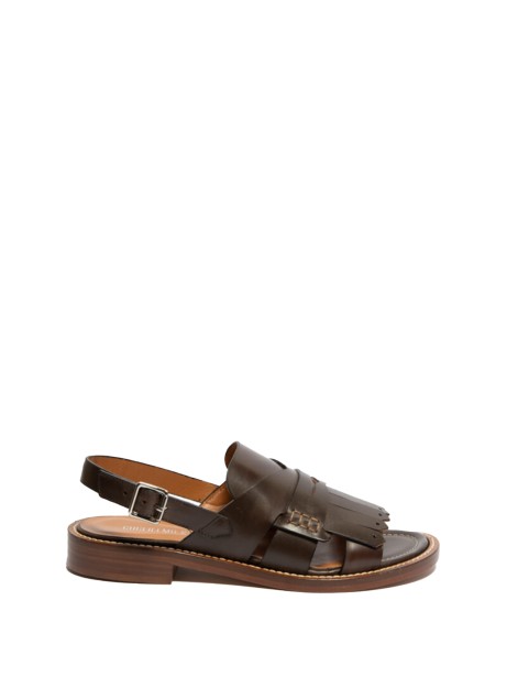 Flat leather sandal with fringes