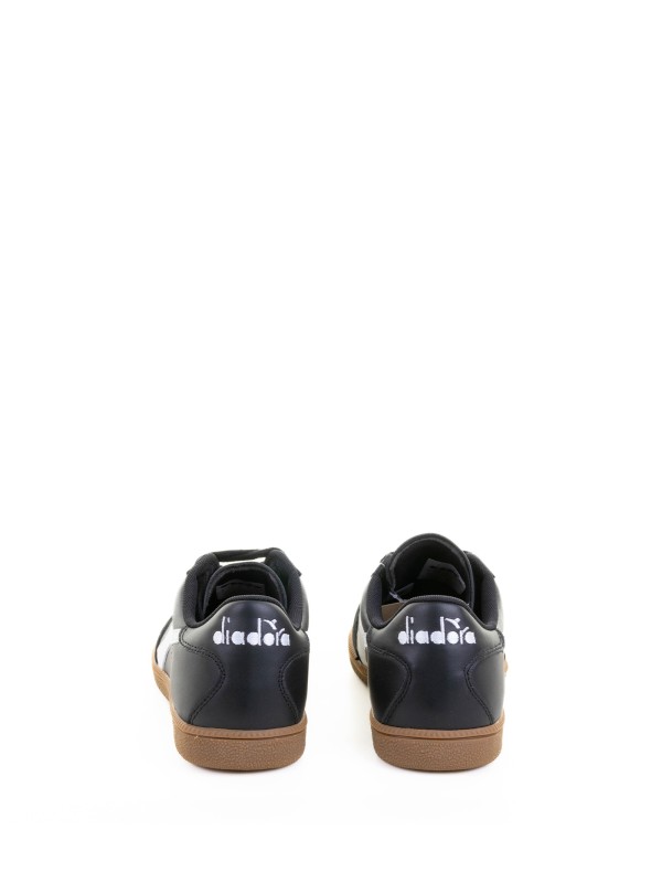 Sneaker nera in pelle e suede