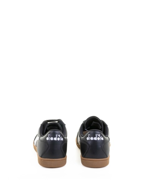 Sneaker nera in pelle e suede