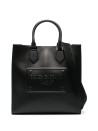 Leather shopping bag with logo and shoulder strap.