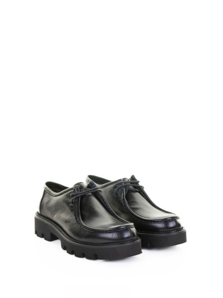 Beatles flat nero in pelle