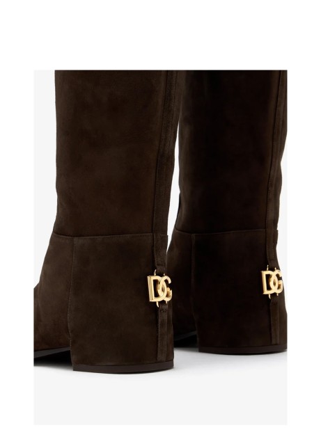 Ebony suede knee-high boot with contrasting logo plaque