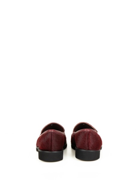 Mocassino pony bordeaux con morsetto
