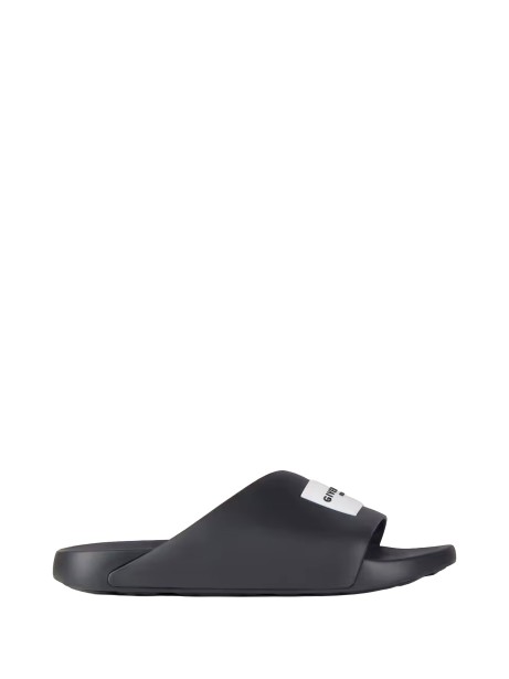 Givenchy Label Slide Flat Mules in Black Rubber