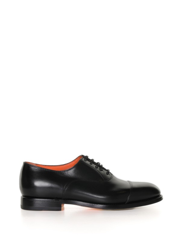 Oxford shoes in leather with toe cap Oxford shoes in leather with toe cap