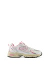 530 white pink sneakers