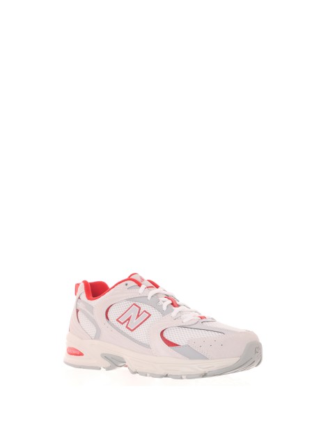 530 white red sneakers