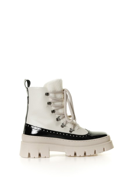 White leather ankle boot with patent leather details