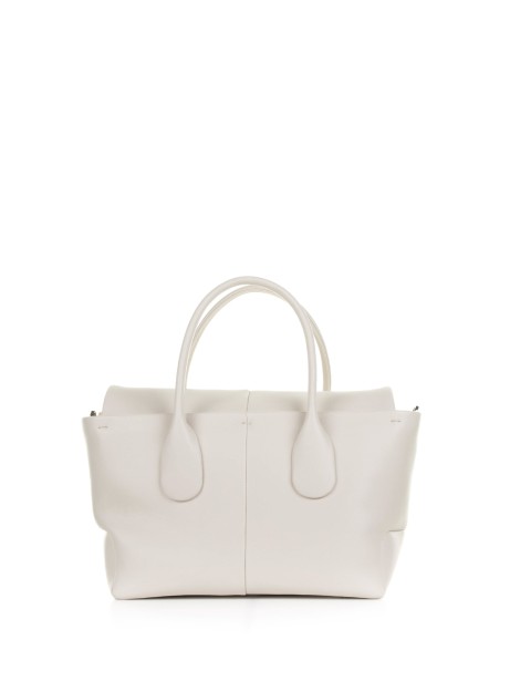 Reverse small double handle bag in leather