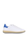 White leather sneaker and blue heel