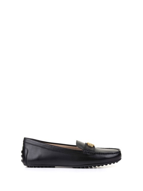 Mocassino gommino nero in pelle con placca logo Mocassino gommino nero in pelle con placca logo