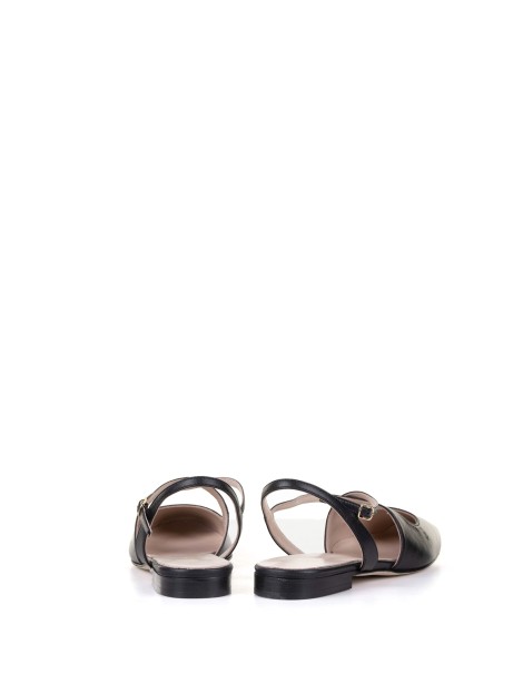 Chanel low black leather with crossed strap