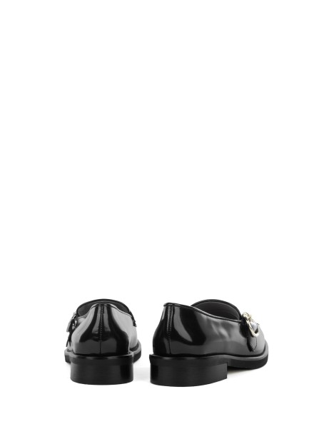 Black leather moccasin with fringe