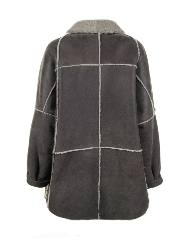Long coat in sheepskin and curly wool