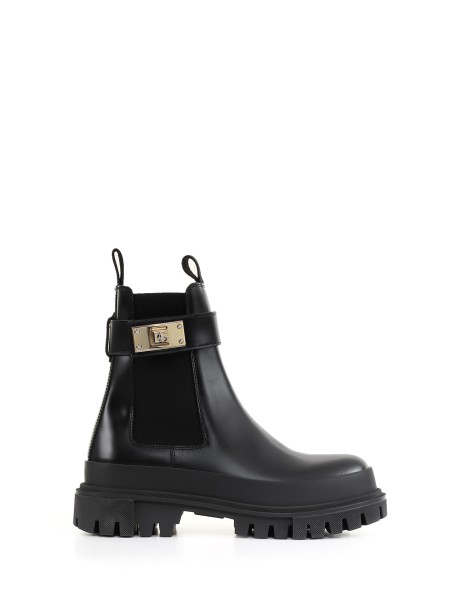 Ankle boot with logoed strap