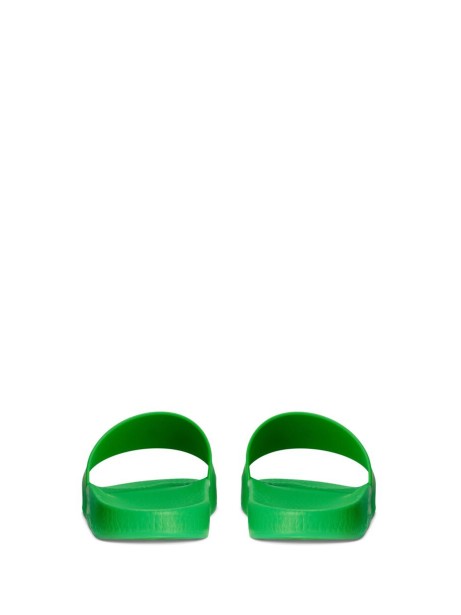 Rubber slipper with logo