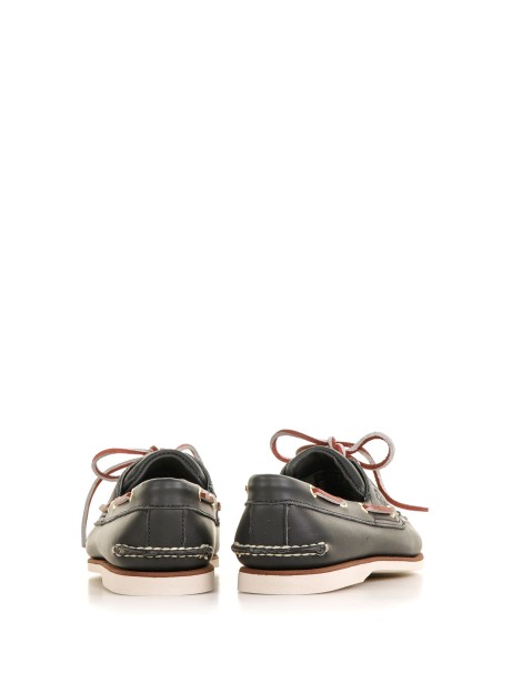 Boat shoes with lace detail