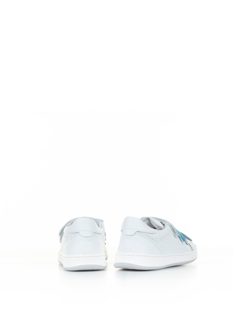 White and blue sneaker with strap