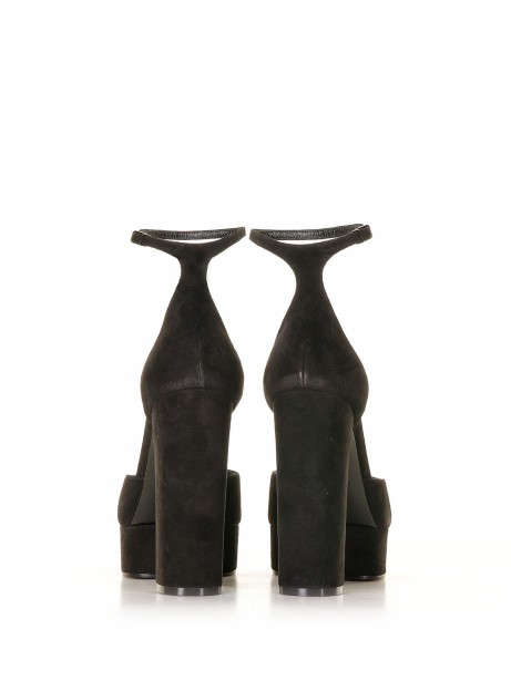 Décolleté in suede with plateau