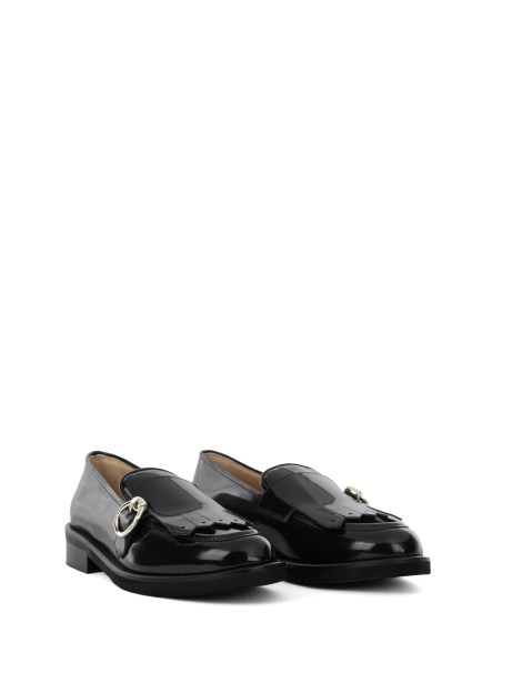 Black leather moccasin with fringe