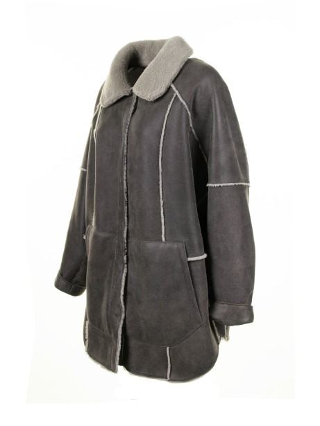 Long coat in sheepskin and curly wool