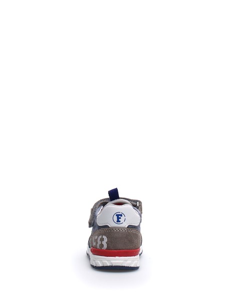 Camouflage sneaker with tear