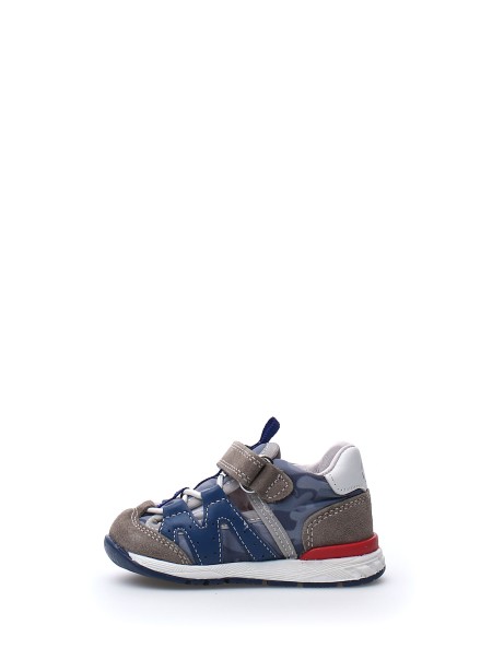 Camouflage sneaker with tear