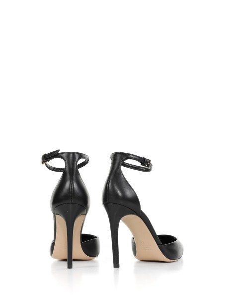 Pumps with strap