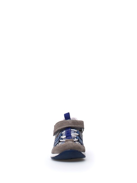 Camouflage sneaker with tear