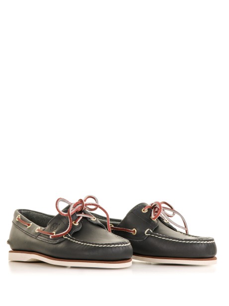 Boat shoes with lace detail