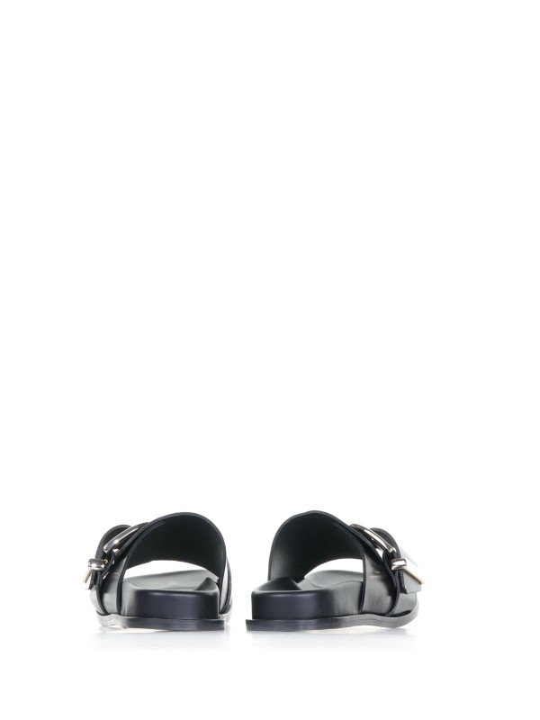 Leather slipper with maxi buckle