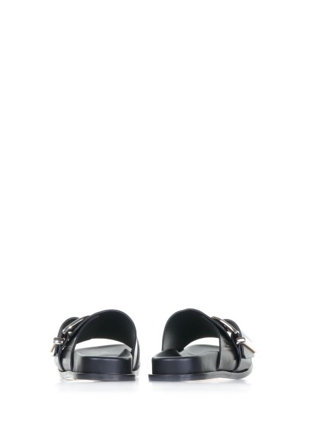 Leather slipper with maxi buckle