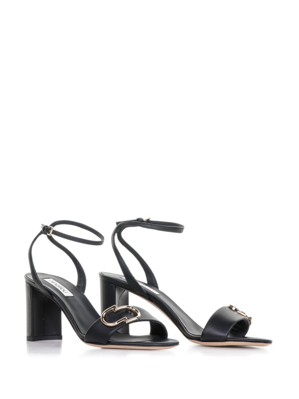 Sandal with heel and strap