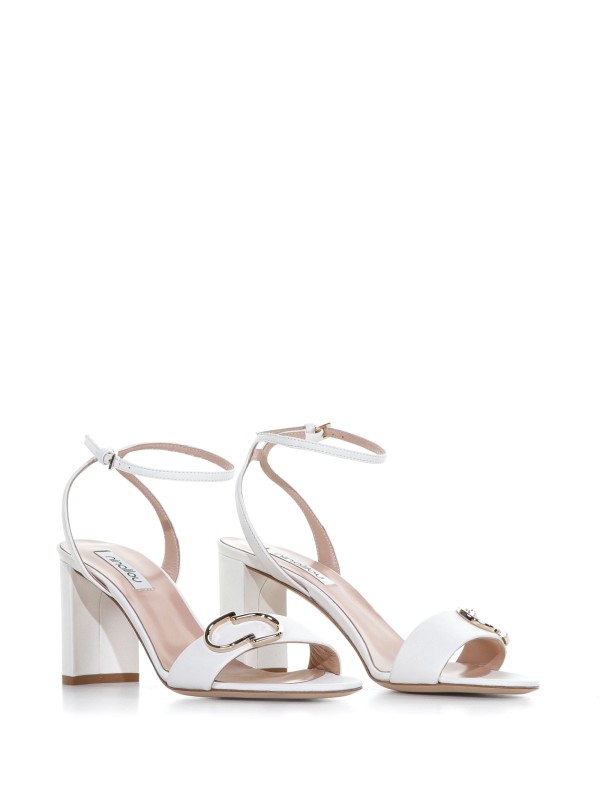 Sandal with heel and strap