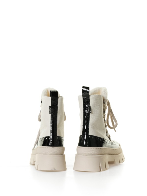 White leather ankle boot with patent leather details