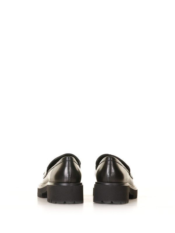 Black leather loafer with fringes